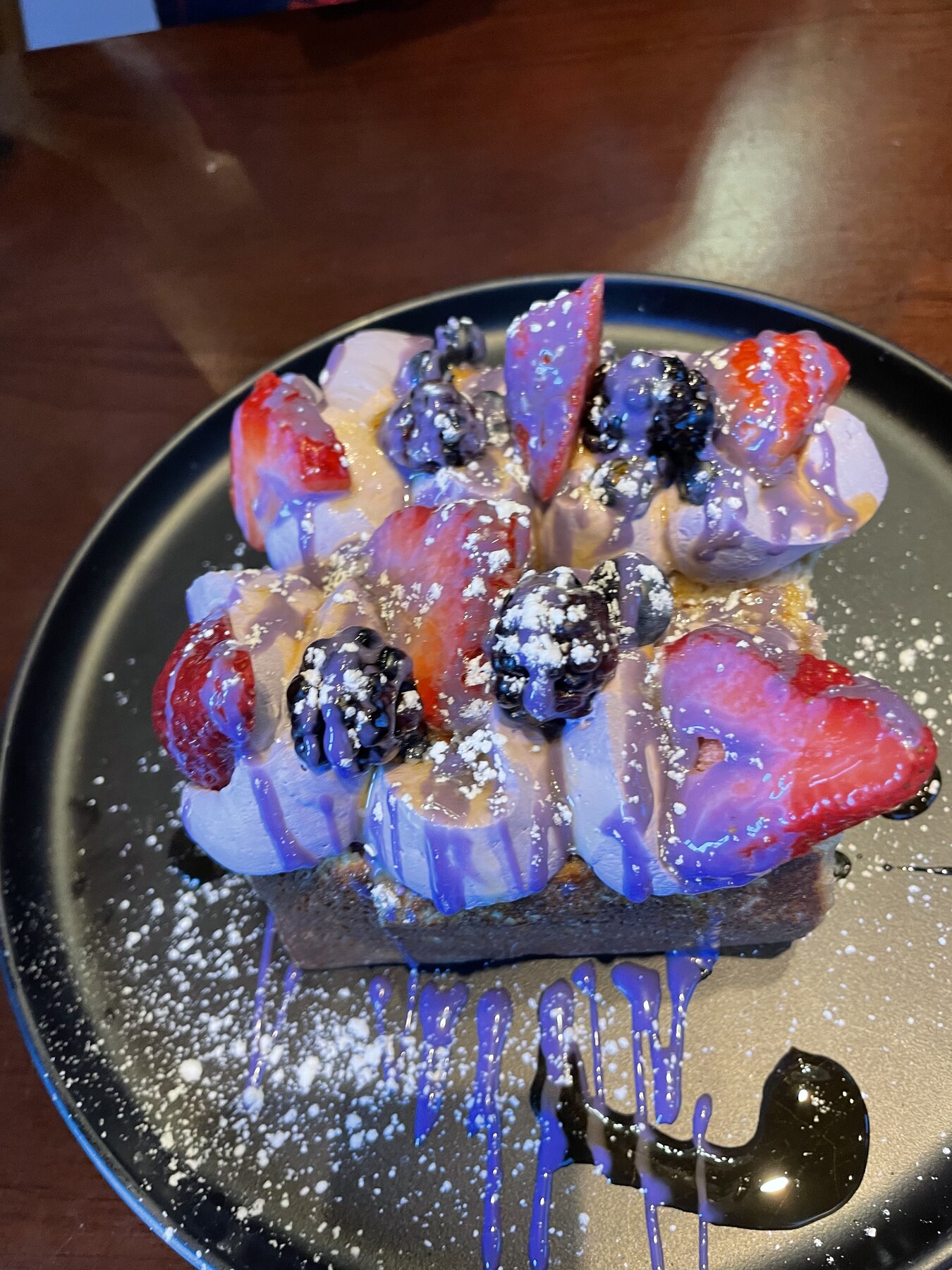 Colorful chef-composed sushi platter with edible flowers